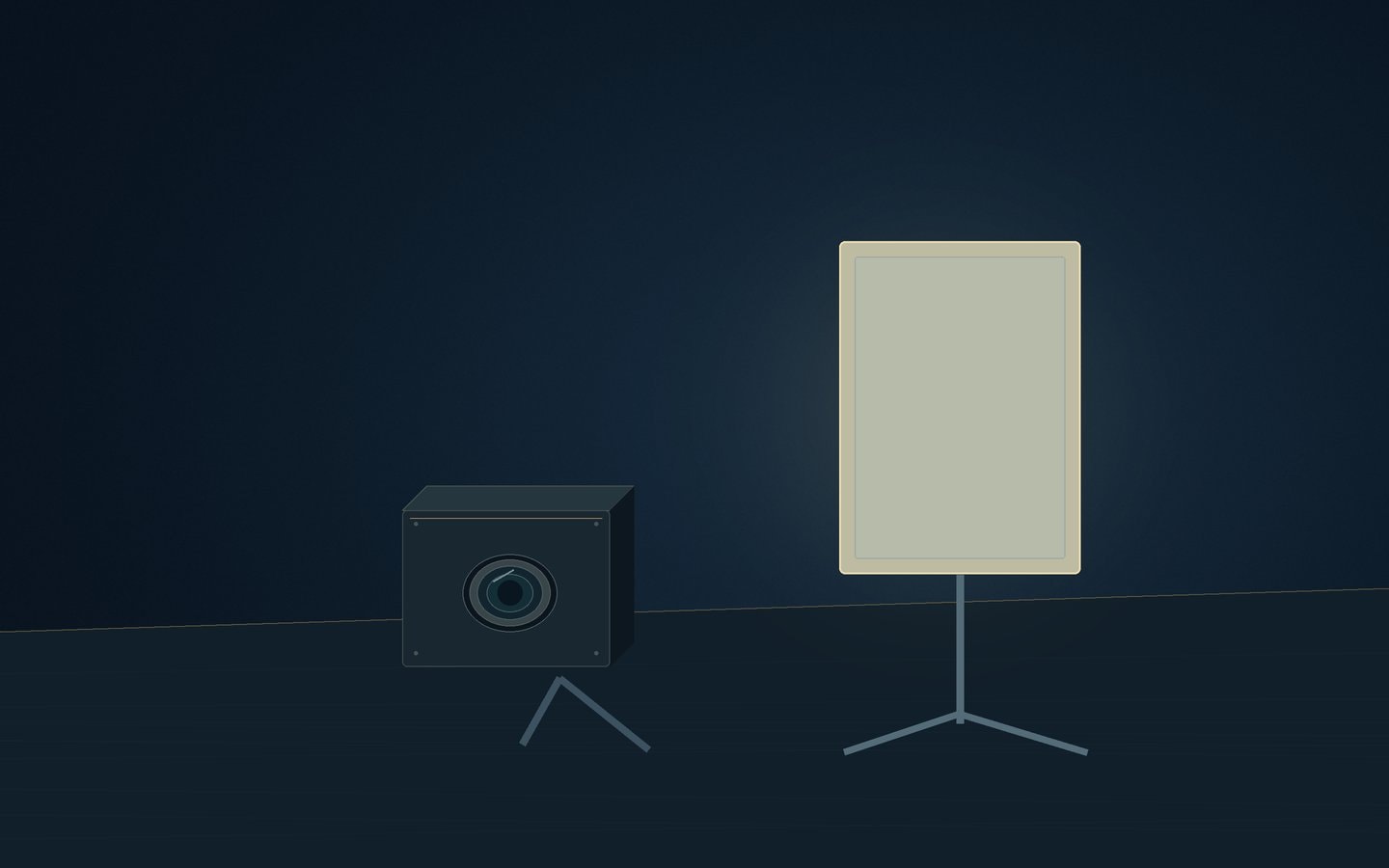 Small camera facing a softly illuminated pale panel on a dark bench