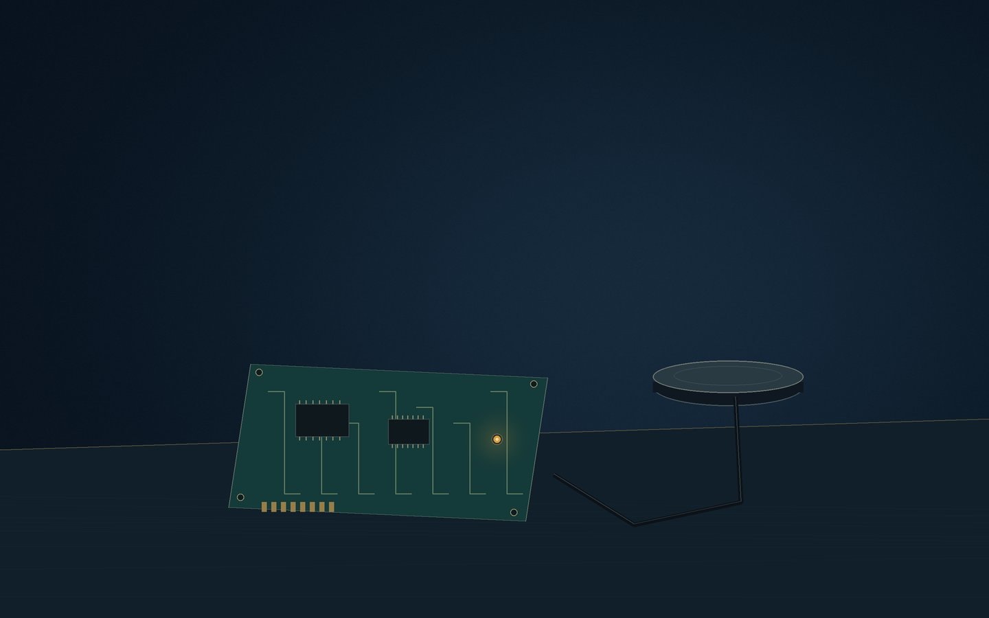 Small circuit board with an amber indicator light beside a round antenna puck