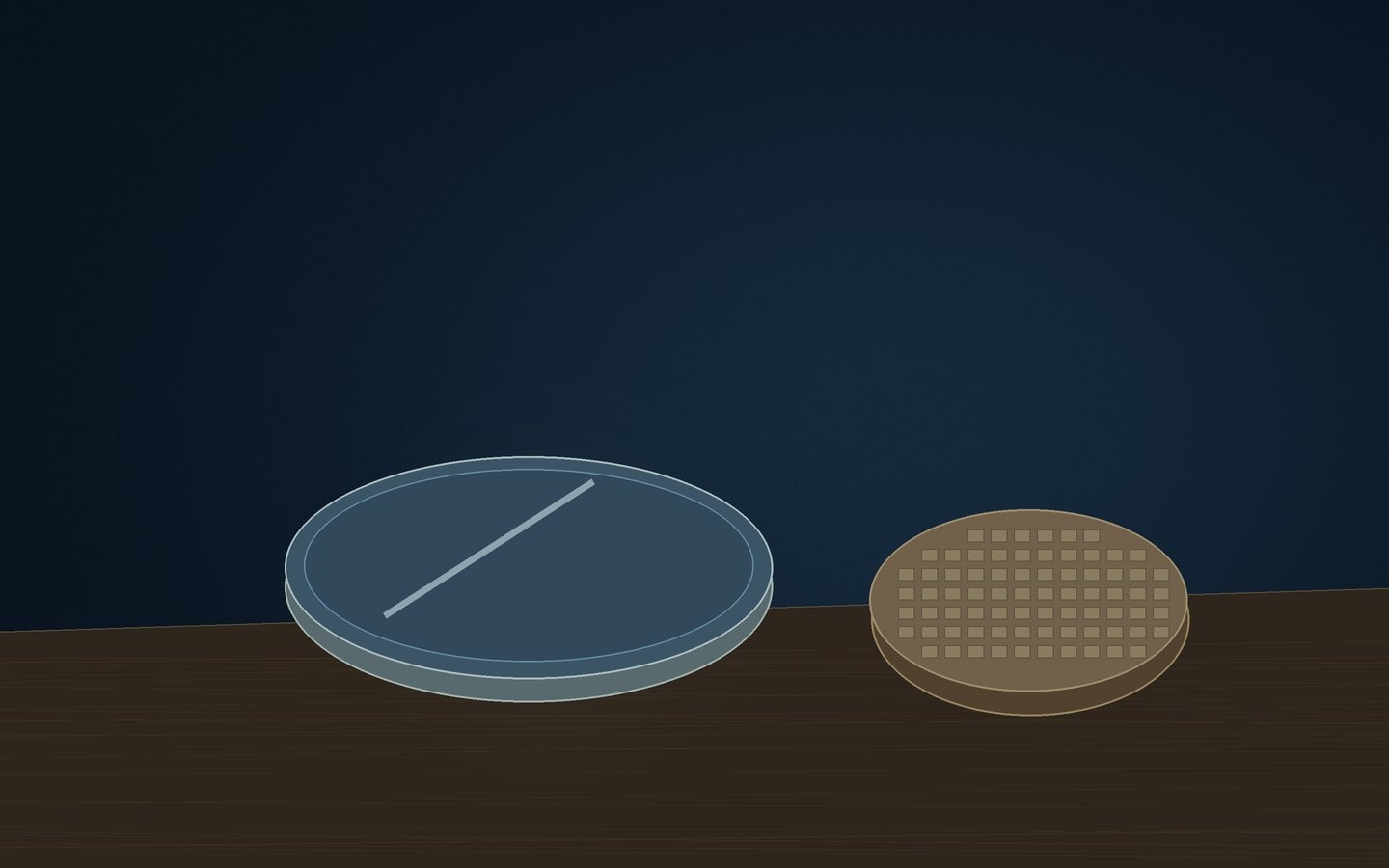 Round glass mirror blank and a textured grinding tool on a wooden workbench